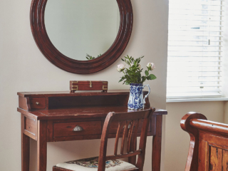 An antique dressing table in a Deluxe Room in Brambles hotel in Inveraray in Scotland
