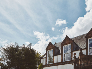 The exterior of the upper section of the old building of Lochview Apartment part of Brambles hotel in Inveraray in Scotland